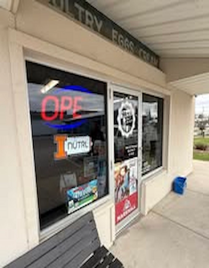 storefront exterior window cleaning for moe package liquours in marshall illinois
